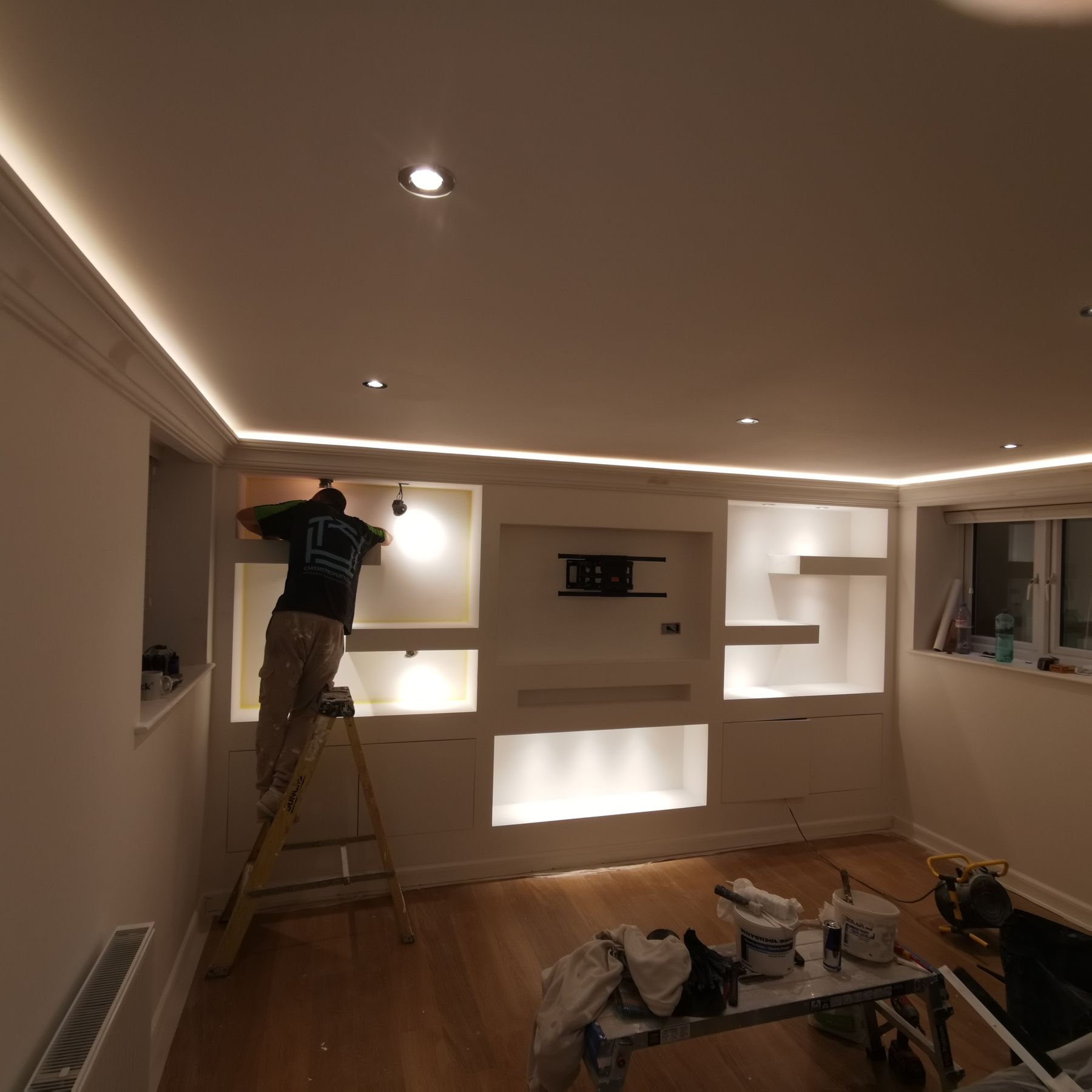 Fitting LED cove lighting into an asymmetric backlit media wall